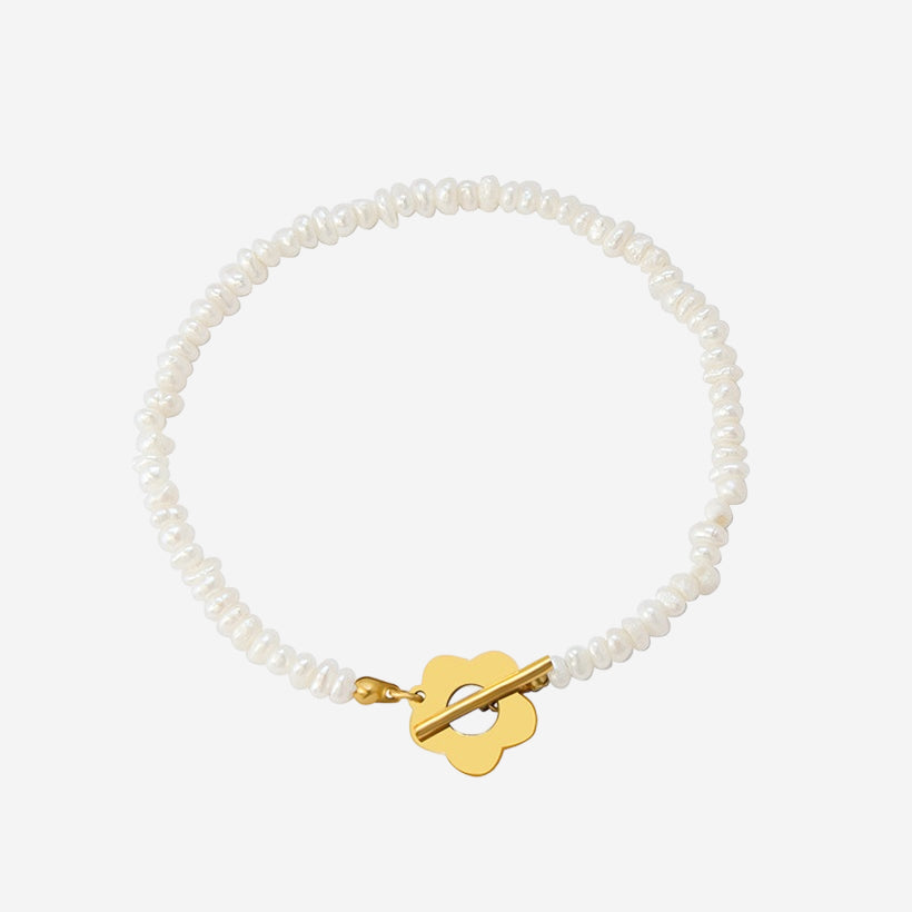 BRACCIALE CON PERLE DI FIORI
